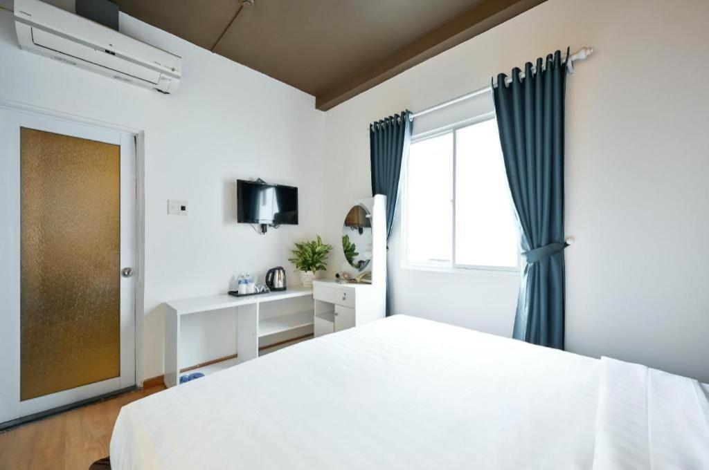 The Noble Swan Wood Park Hotel Cidade de Ho Chi Minh Exterior foto