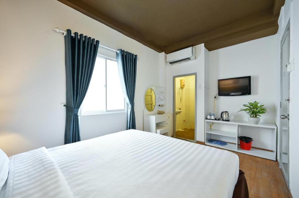 The Noble Swan Wood Park Hotel Cidade de Ho Chi Minh Exterior foto